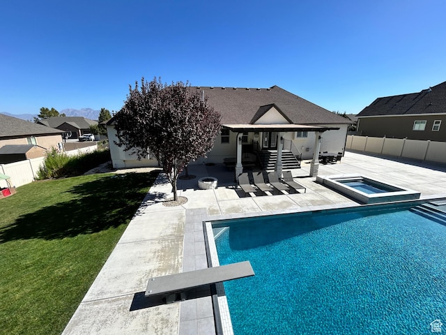 10124 S Autumn Breeze Ln W, South Jordan, UT 84009 - view of pool with a yard, a fenced backyard, a patio area, an in ground hot tub, and a fenced in pool