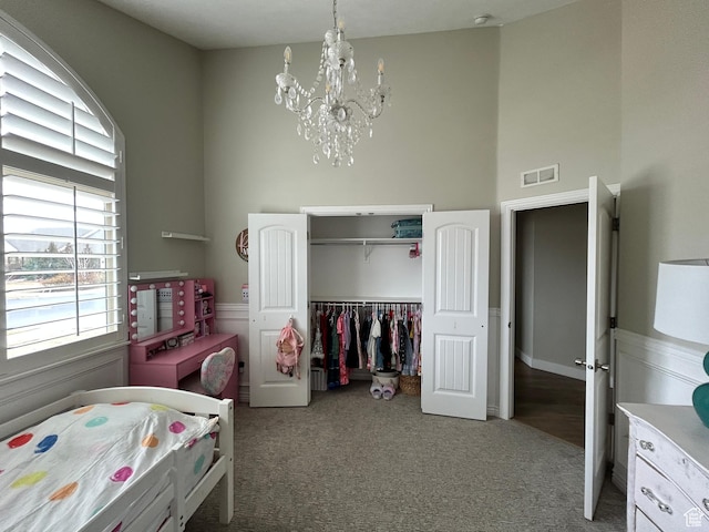 10124 S Autumn Breeze Ln W, South Jordan, UT 84009 - carpeted bedroom with a chandelier, a closet, and visible vents