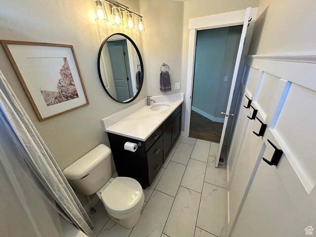 10124 S Autumn Breeze Ln W, South Jordan, UT 84009 - bathroom with toilet, marble finish floor, and vanity