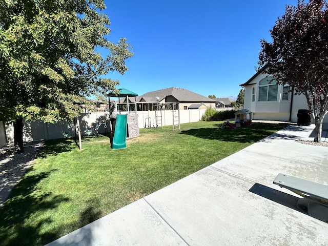 10124 S Autumn Breeze Ln W, South Jordan, UT 84009 - view of yard with a fenced backyard, a playground, and a patio area