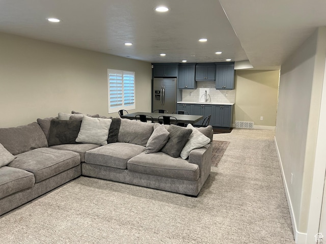 10124 S Autumn Breeze Ln W, South Jordan, UT 84009 - living room with recessed lighting, visible vents, light colored carpet, and baseboards