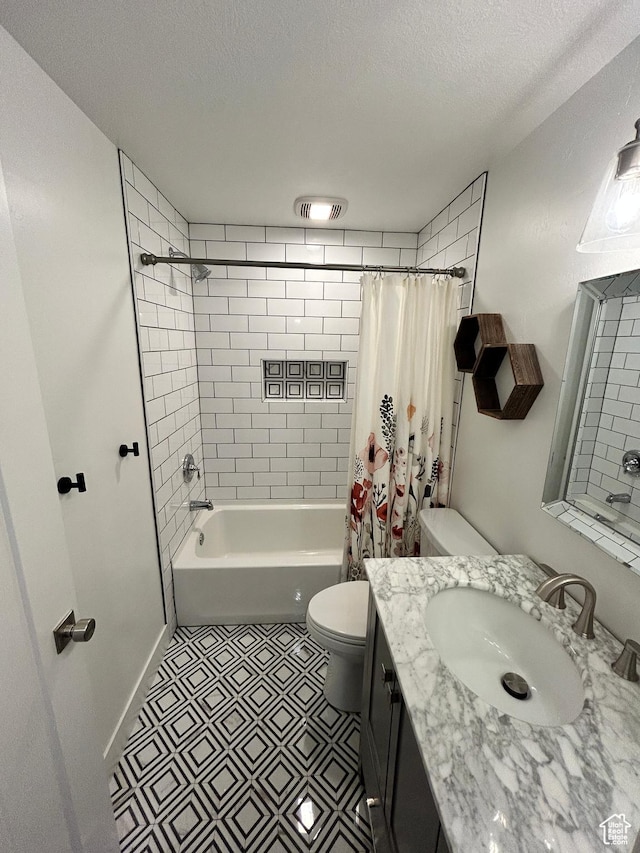 10124 S Autumn Breeze Ln W, South Jordan, UT 84009 - full bathroom with a textured ceiling, vanity, visible vents, toilet, and shower / tub combo