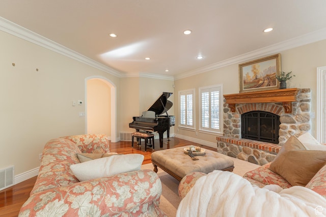 6041 S 2230 E, Holladay, UT 84121 - living room with recessed lighting, wood finished floors, visible vents, ornamental molding, and arched walkways
