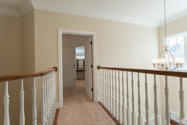 6041 S 2230 E, Holladay, UT 84121 - hall featuring an upstairs landing, light carpet, ornamental molding, and an inviting chandelier