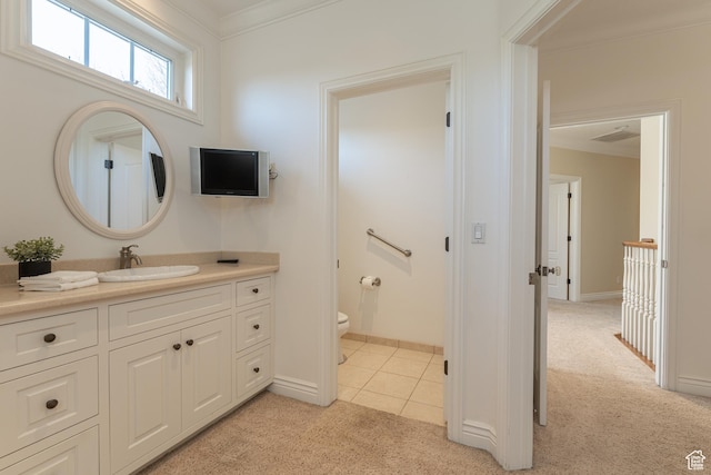 6041 S 2230 E, Holladay, UT 84121 - bathroom featuring tile patterned floors, toilet, baseboards, vanity, and ornamental molding
