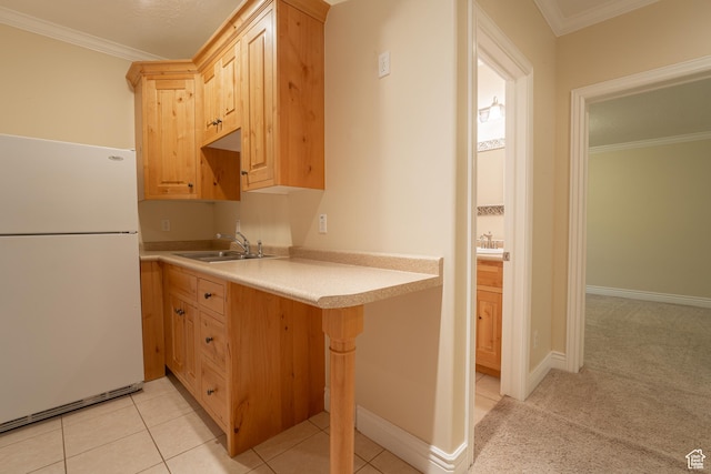 6041 S 2230 E, Holladay, UT 84121 - kitchen with a sink, freestanding refrigerator, light brown cabinets, light countertops, and ornamental molding
