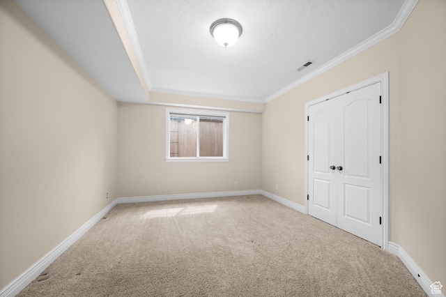 6041 S 2230 E, Holladay, UT 84121 - unfurnished bedroom featuring visible vents, carpet flooring, and crown molding