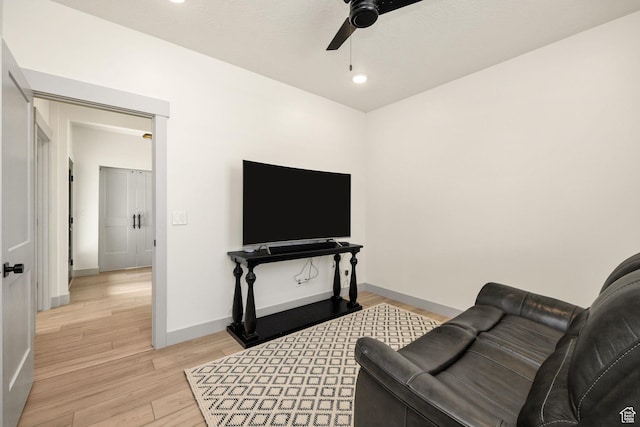 48 S 650 W, Hyrum, UT 84319 - living room with a ceiling fan, light wood finished floors, and baseboards