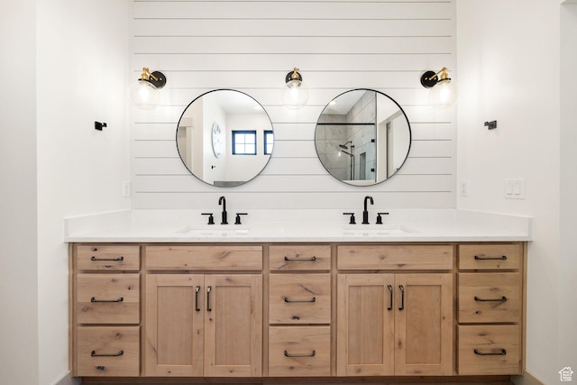 48 S 650 W, Hyrum, UT 84319 - full bathroom featuring double vanity and a shower with door