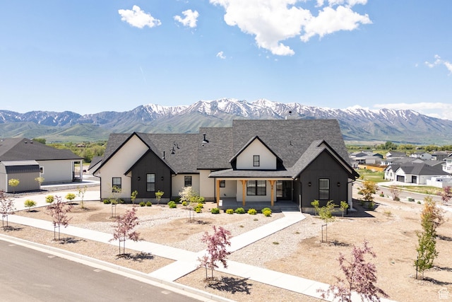48 S 650 W, Hyrum, UT 84319 - modern inspired farmhouse with a mountain view, roof with shingles, and a porch