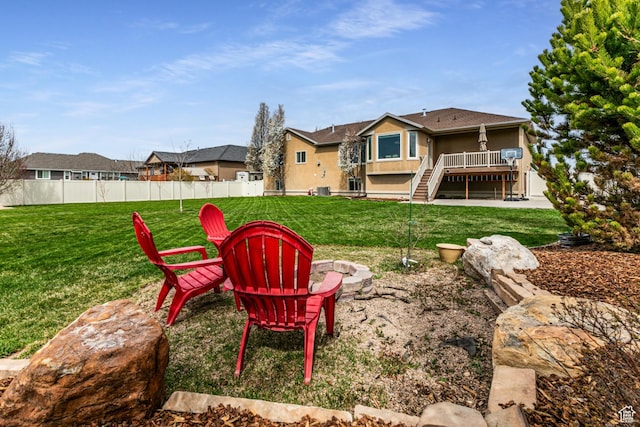 4781 W 4100 S, West Haven, UT 84401 - view of yard with a fire pit, stairs, a wooden deck, and a residential view