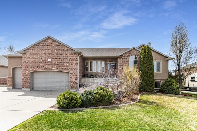 view of front of property with brick siding, a garage, and concrete driveway