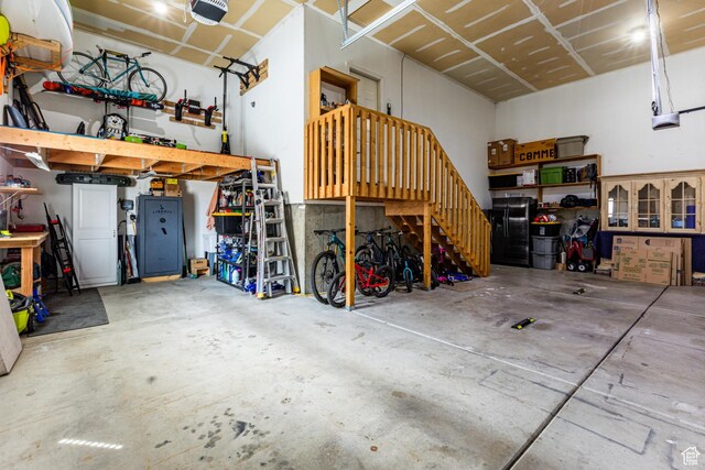 4781 W 4100 S, West Haven, UT 84401 - garage featuring a workshop area and a garage door opener
