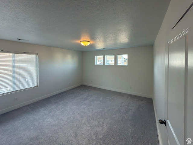 5051 W Bilston Ln S, Herriman, UT 84096 - spare room with visible vents, a textured ceiling, baseboards, and carpet floors