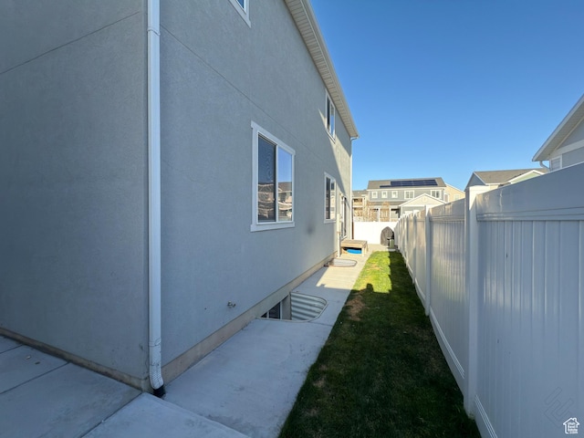 5051 W Bilston Ln S, Herriman, UT 84096 - view of side of home with fence and stucco siding