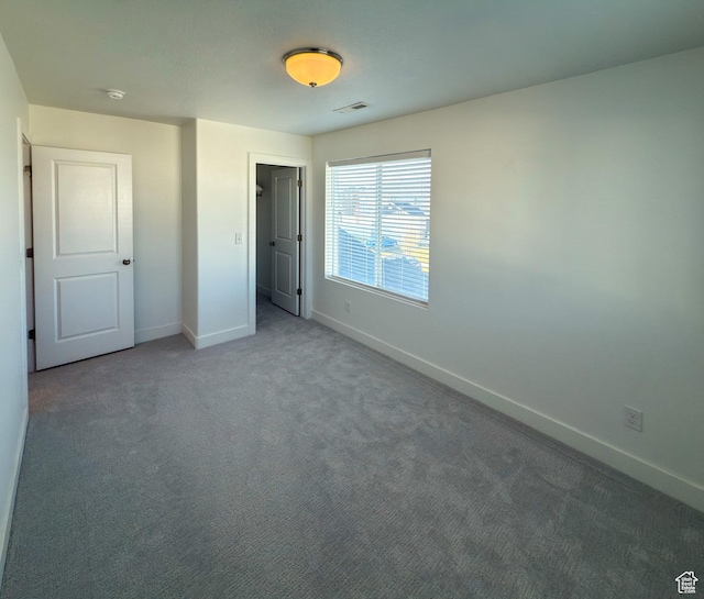5051 W Bilston Ln S, Herriman, UT 84096 - unfurnished bedroom with carpet floors, baseboards, and visible vents