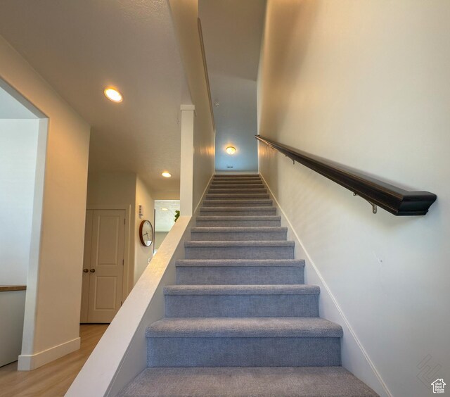 5051 W Bilston Ln S, Herriman, UT 84096 - stairway featuring recessed lighting, baseboards, and wood finished floors