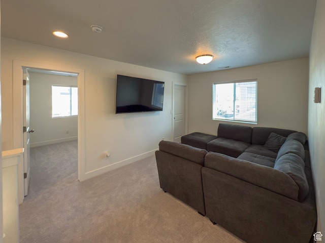 5051 W Bilston Ln S, Herriman, UT 84096 - living area with light carpet, baseboards, and a wealth of natural light