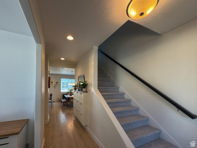 5051 W Bilston Ln S, Herriman, UT 84096 - stairs with recessed lighting and wood finished floors