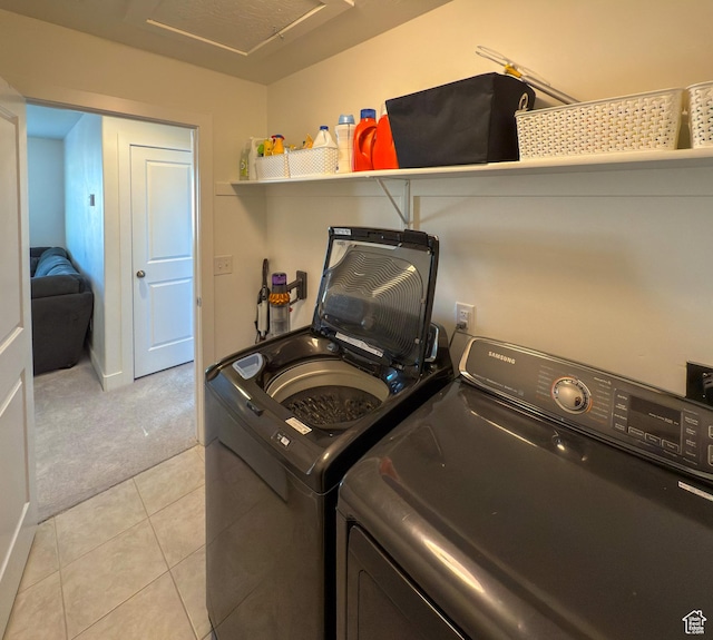 5051 W Bilston Ln S, Herriman, UT 84096 - washroom with light tile patterned floors, attic access, laundry area, washer and dryer, and light colored carpet