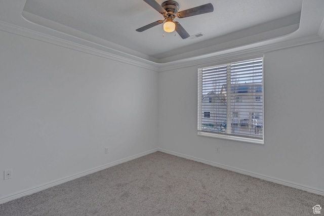 8079 S Juniper Ct, South Weber, UT 84405 - unfurnished room with visible vents, baseboards, ceiling fan, a tray ceiling, and carpet flooring
