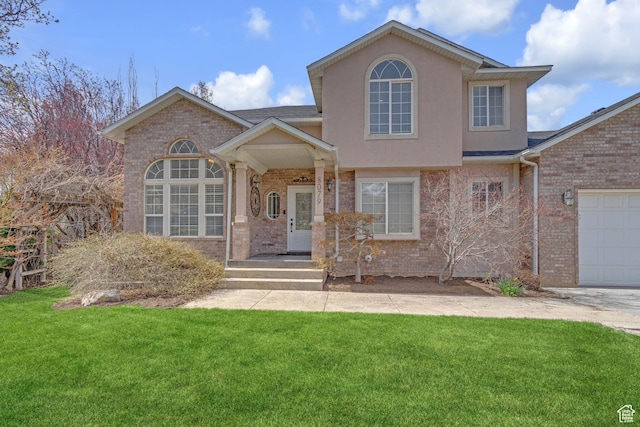 8079 S Juniper Ct, South Weber, UT 84405 - traditional-style house with brick siding, a front lawn, an attached garage, and roof with shingles