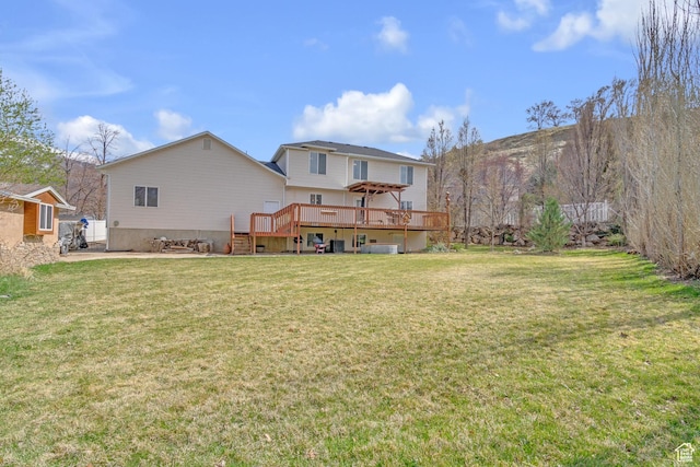 8079 S Juniper Ct, South Weber, UT 84405 - back of property with a wooden deck and a lawn