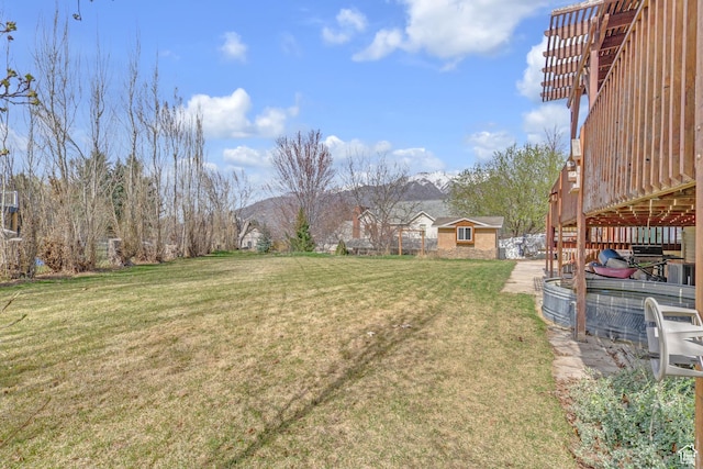 8079 S Juniper Ct, South Weber, UT 84405 - view of yard featuring an outdoor structure and a mountain view