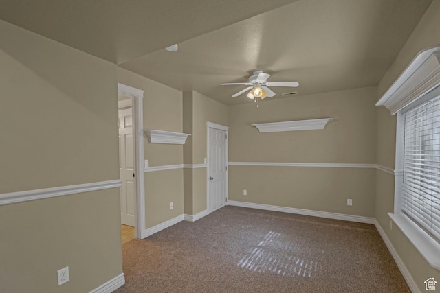 8079 S Juniper Ct, South Weber, UT 84405 - spare room featuring carpet flooring, baseboards, and a ceiling fan