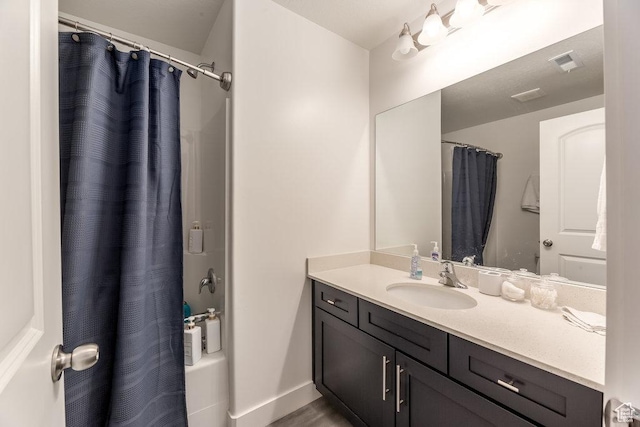 3833 W 1960 N, Lehi, UT 84043 - bathroom featuring shower / tub combo, vanity, baseboards, and visible vents