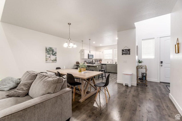 3833 W 1960 N, Lehi, UT 84043 - dining room featuring recessed lighting, a notable chandelier, baseboards, and dark wood finished floors