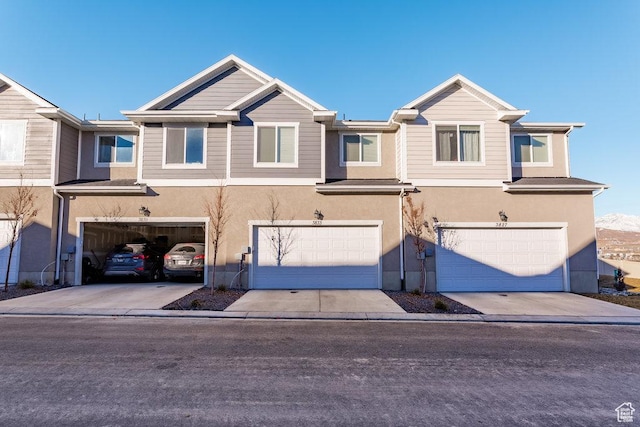 3833 W 1960 N, Lehi, UT 84043 - multi unit property featuring a garage, driveway, and stucco siding
