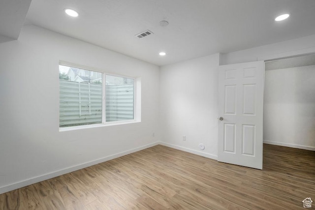 3833 W 1960 N, Lehi, UT 84043 - empty room with visible vents, baseboards, recessed lighting, and wood finished floors