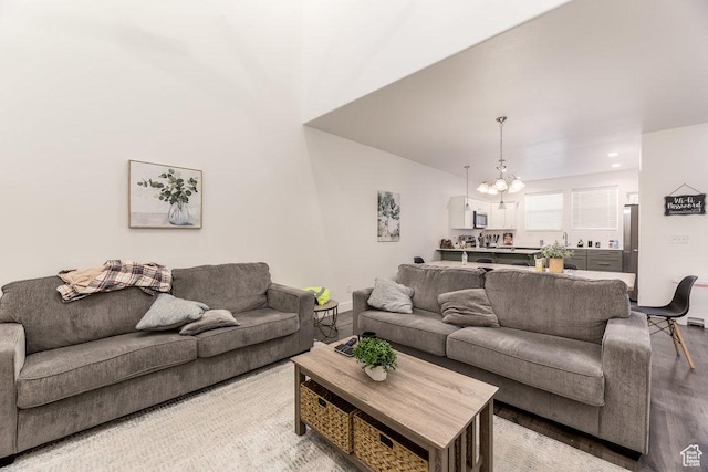 3833 W 1960 N, Lehi, UT 84043 - living area featuring a chandelier and light wood-style flooring