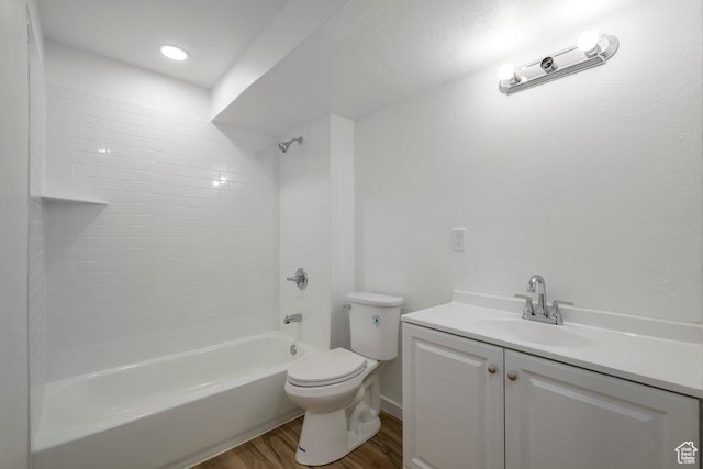 3833 W 1960 N, Lehi, UT 84043 - bathroom with toilet, wood finished floors, vanity, and bathtub / shower combination