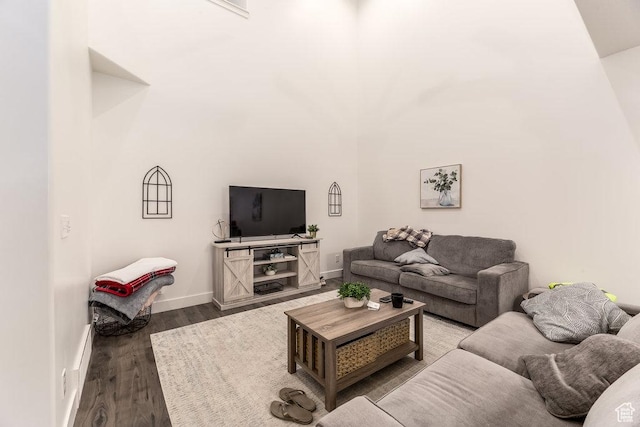 3833 W 1960 N, Lehi, UT 84043 - living area featuring a high ceiling, baseboards, and wood finished floors