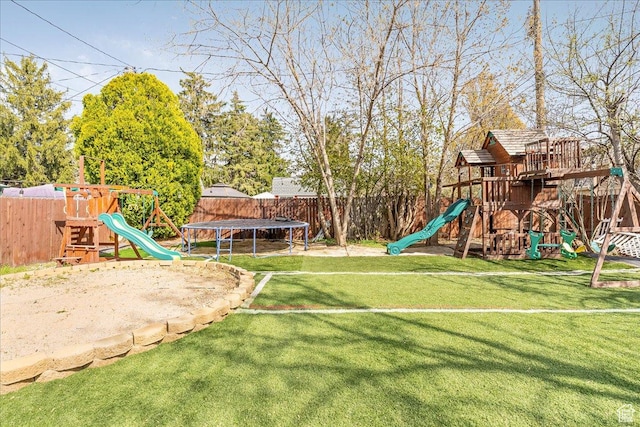 3165 S 2000 E, Millcreek, UT 84109 - view of playground with a trampoline, a fenced backyard, and a lawn
