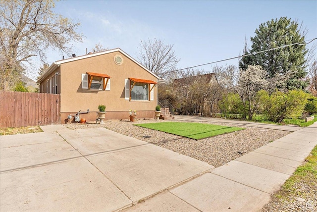3165 S 2000 E, Millcreek, UT 84109 - view of front of house with stucco siding and fence