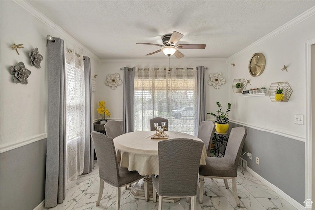 3165 S 2000 E, Millcreek, UT 84109 - dining area with baseboards, marble finish floor, a textured ceiling, and a ceiling fan