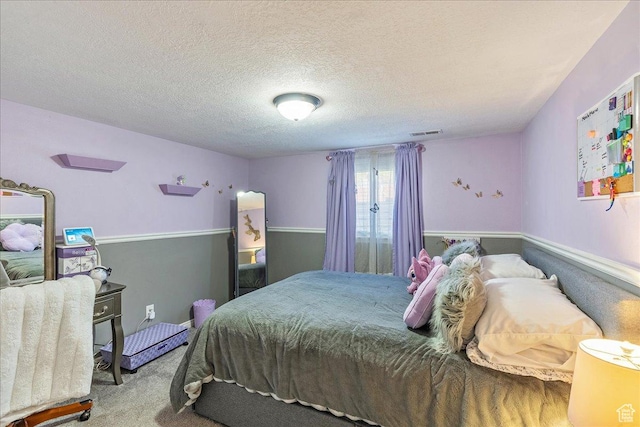 3165 S 2000 E, Millcreek, UT 84109 - bedroom featuring visible vents, a textured ceiling, and carpet floors