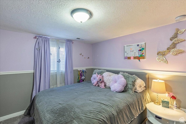 3165 S 2000 E, Millcreek, UT 84109 - carpeted bedroom with visible vents, baseboards, and a textured ceiling