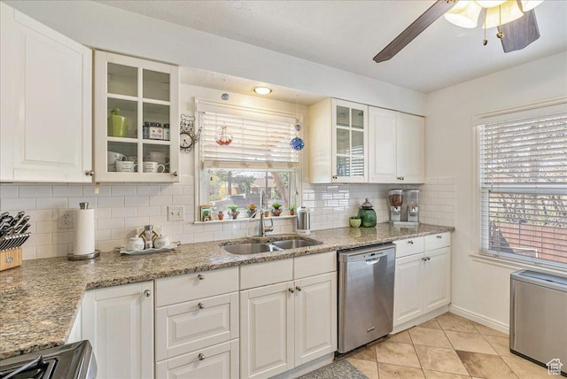 3165 S 2000 E, Millcreek, UT 84109 - kitchen featuring backsplash, a ceiling fan, white cabinets, stainless steel dishwasher, and a sink