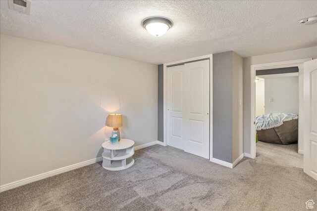 3165 S 2000 E, Millcreek, UT 84109 - unfurnished bedroom featuring visible vents, baseboards, a closet, and carpet floors