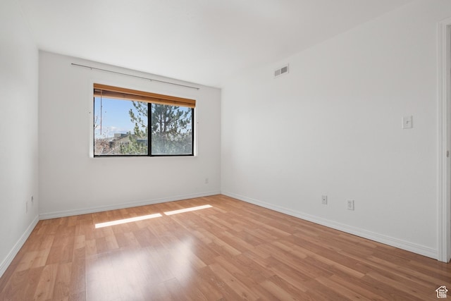 6831 N 2200 W Unit 12K, Park City, UT 84098 - empty room featuring visible vents, baseboards, and light wood finished floors
