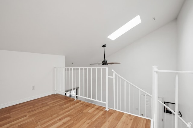 6831 N 2200 W Unit 12K, Park City, UT 84098 - interior space featuring a skylight, high vaulted ceiling, light wood finished floors, and a ceiling fan