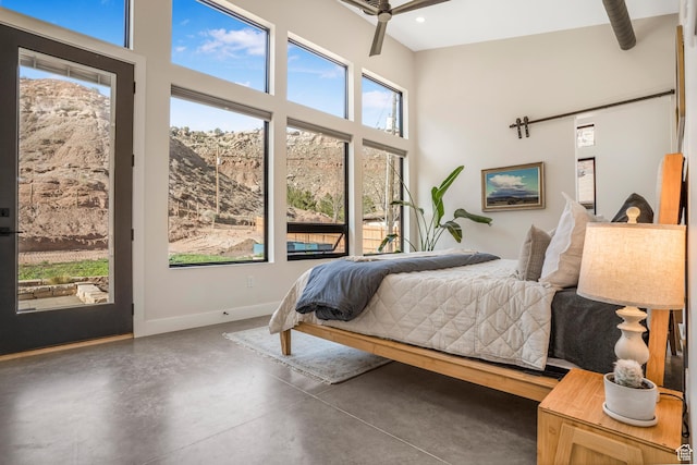 160 W Pebble, Rockville, UT 84763 - bedroom with concrete floors, a towering ceiling, access to exterior, baseboards, and recessed lighting