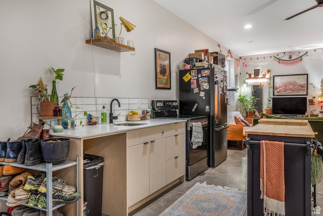 160 W Pebble, Rockville, UT 84763 - kitchen featuring black appliances, a sink, open shelves, concrete flooring, and open floor plan