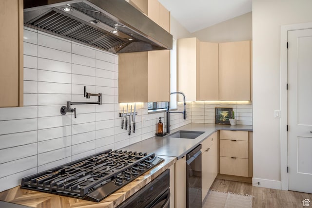 160 W Pebble, Rockville, UT 84763 - kitchen featuring a sink, wall chimney range hood, black stovetop, dishwashing machine, and decorative backsplash