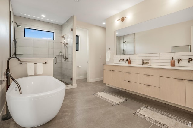 160 W Pebble, Rockville, UT 84763 - bathroom with a stall shower, concrete flooring, double vanity, a freestanding bath, and baseboards