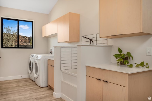 160 W Pebble, Rockville, UT 84763 - clothes washing area featuring cabinet space, baseboards, separate washer and dryer, and light wood-style flooring